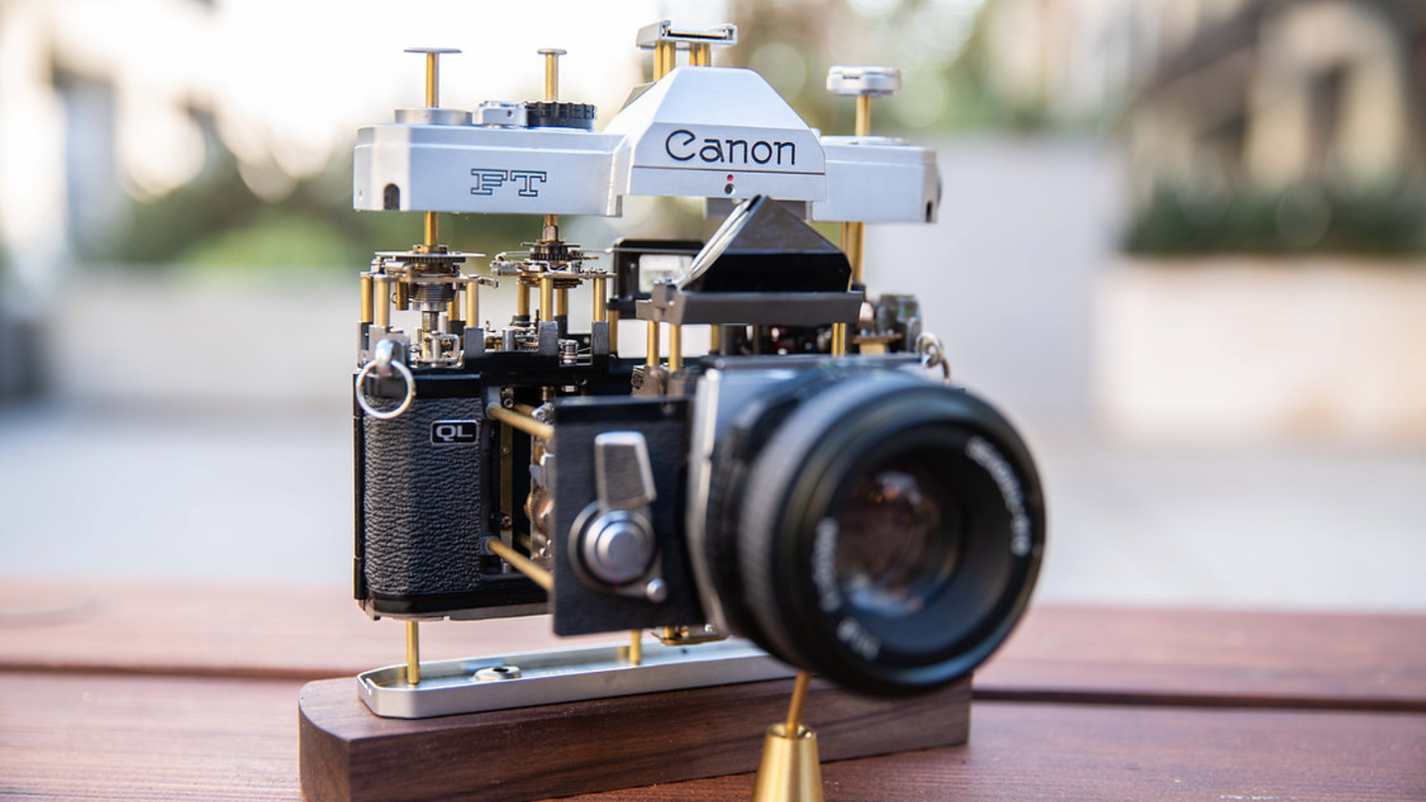 Disassembled Mechanical Film Camera Canon FT: A Vintage Camera Reimagined as Mechanical Art