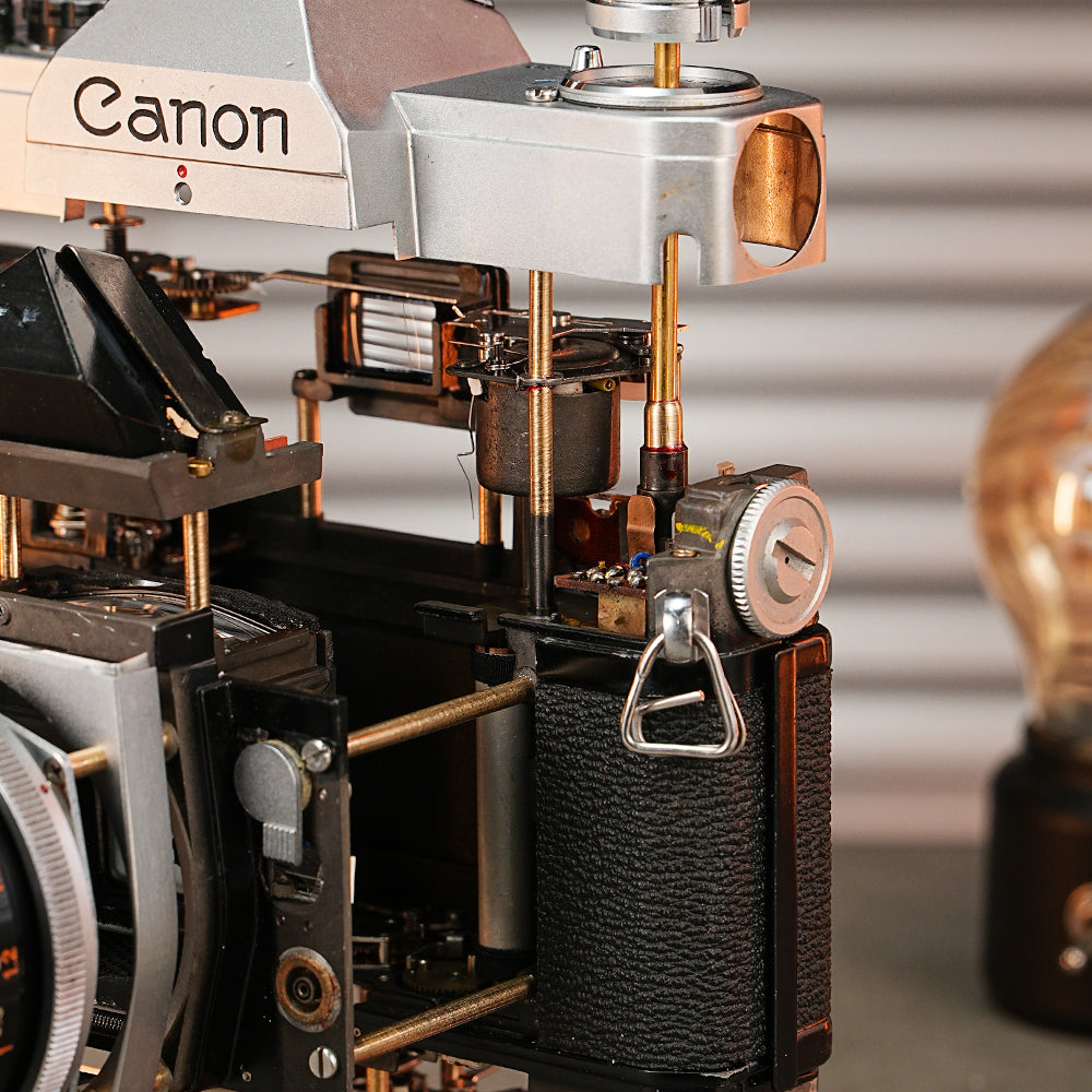 Disassembled Mechanical Film Camera Canon FT With Cut Lens
