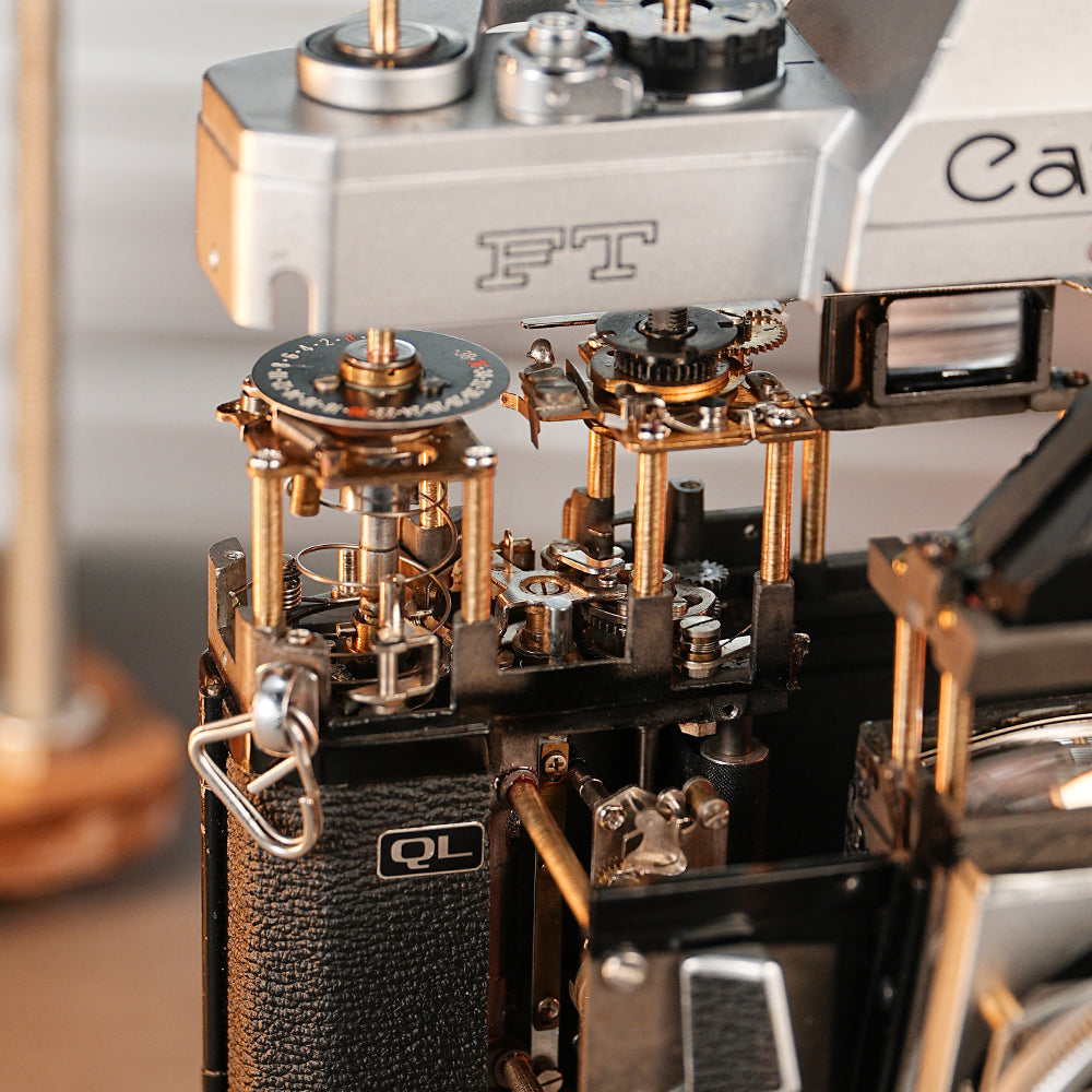 Disassembled Mechanical Film Camera Canon FT With Cut Lens