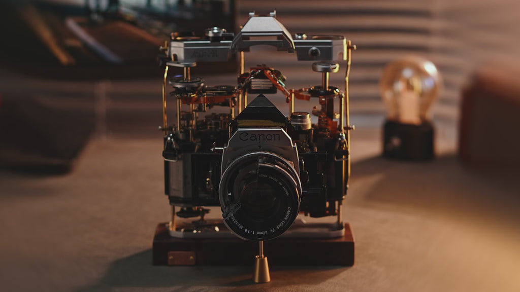 Disassembled Mechanical Film Canon AE-1 Camera , Home Decor, Camera Art